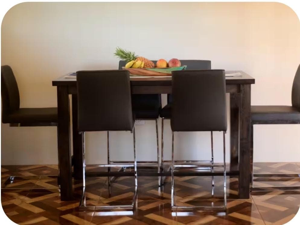 Indoor dining table with elegant chrome chairs